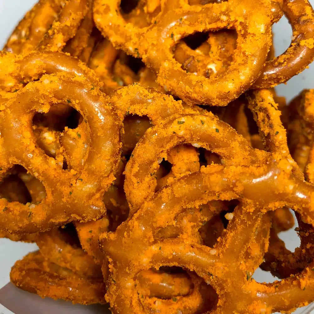 Detailed close-up of jalapeno cheddar pretzels with seasoning
